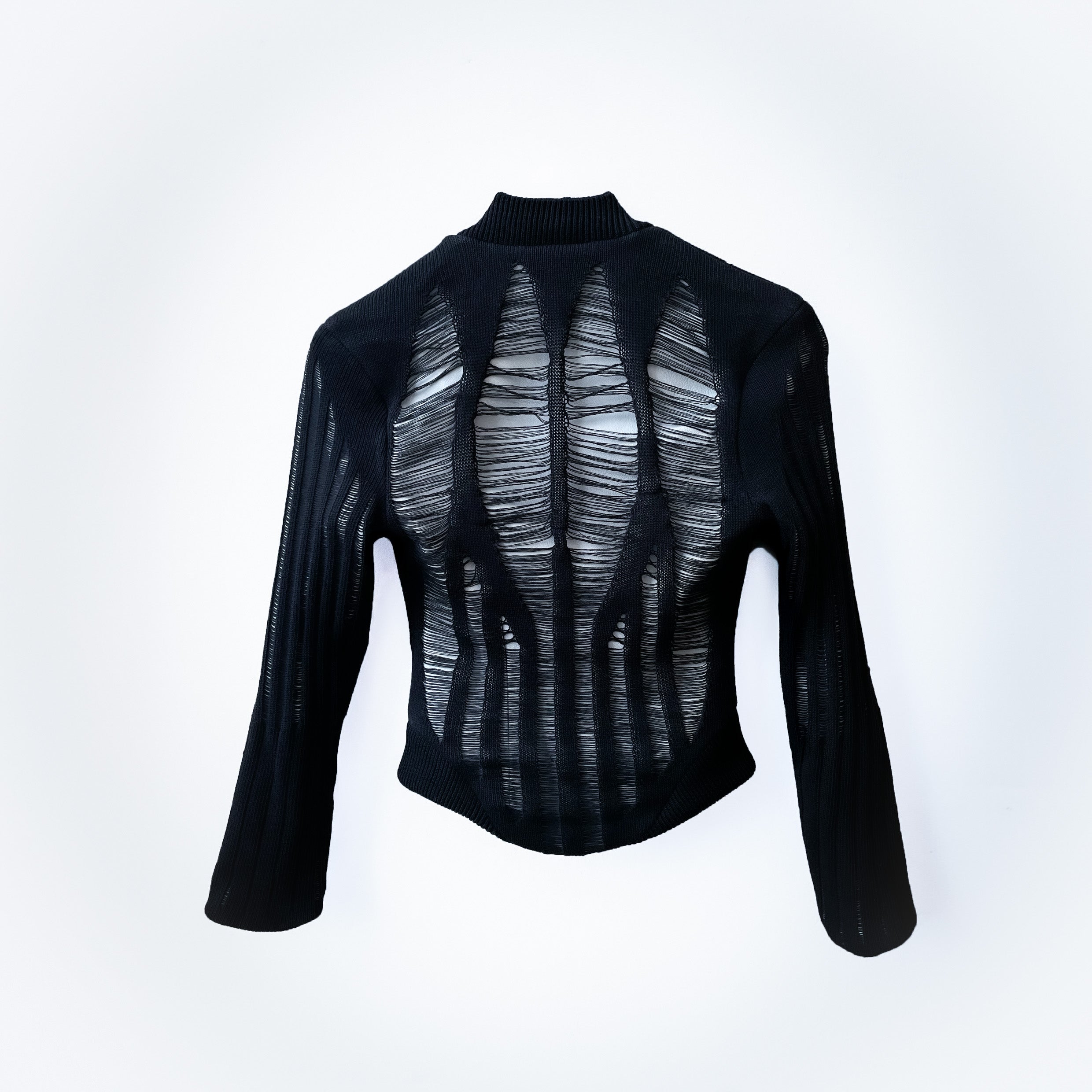 White leather and black knit fitted jacket on light grey background 